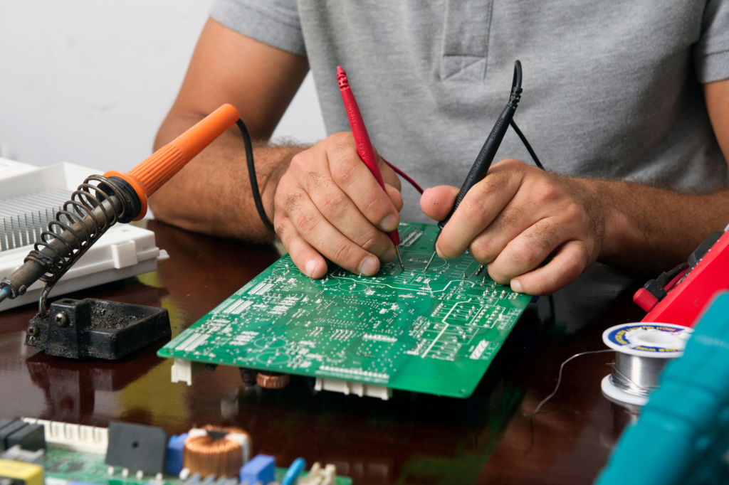 Technician performing tv repair in Johannesburg